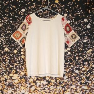 Chic White Tee with Colorful Crochet Sleeves